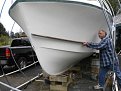 Tom holding the spray knocker.  

Tom said this was bolted to the hull an