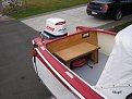 P1010004  New rear seat mahogany with Teak trim   Holds two 6 Gal Gas tanks